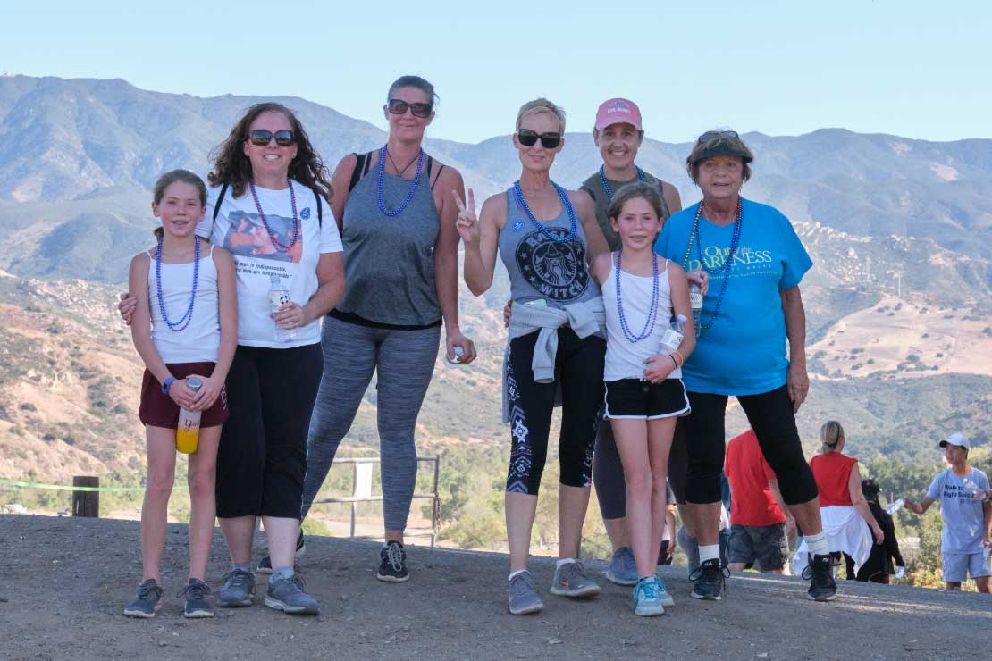 Walkers in front of scenic overlook