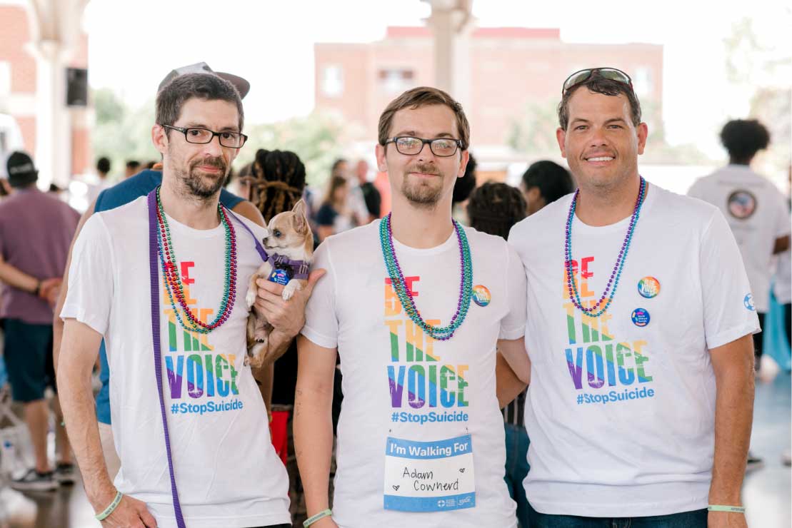 Three walkers in Be the Voice t-shirts
